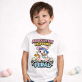 Kids easter Absolutely Hopping Feral  T-Shirt blue worn by a smiling boy, featuring a playful bunny and colorful eggs.