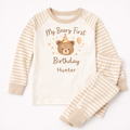 Neutral teddy bear first birthday pyjamas with personalised name Hunter on beige striped baby pajama set