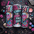 “Colourful 20oz skinny tumbler with ‘Sorry For What My Face Said’ quote, neon smiley face, lightning bolts and floral tattoo design.”